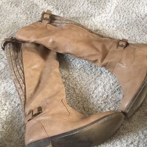 Tan boots with sweater back